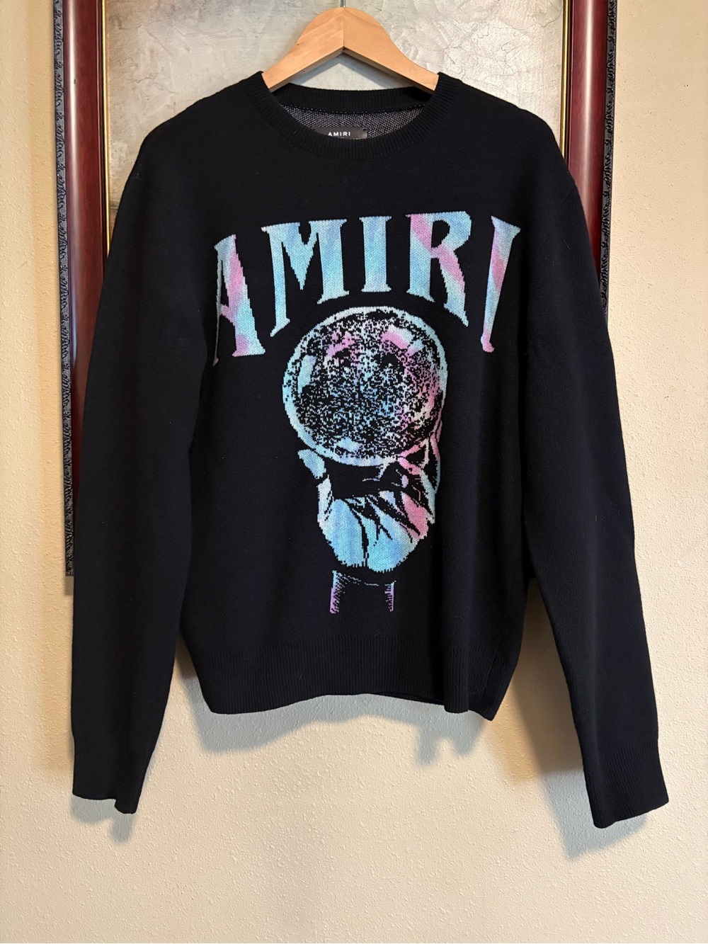 AMIRI Black Crewneck Sweater with Pastel Blue and Pink Graphic